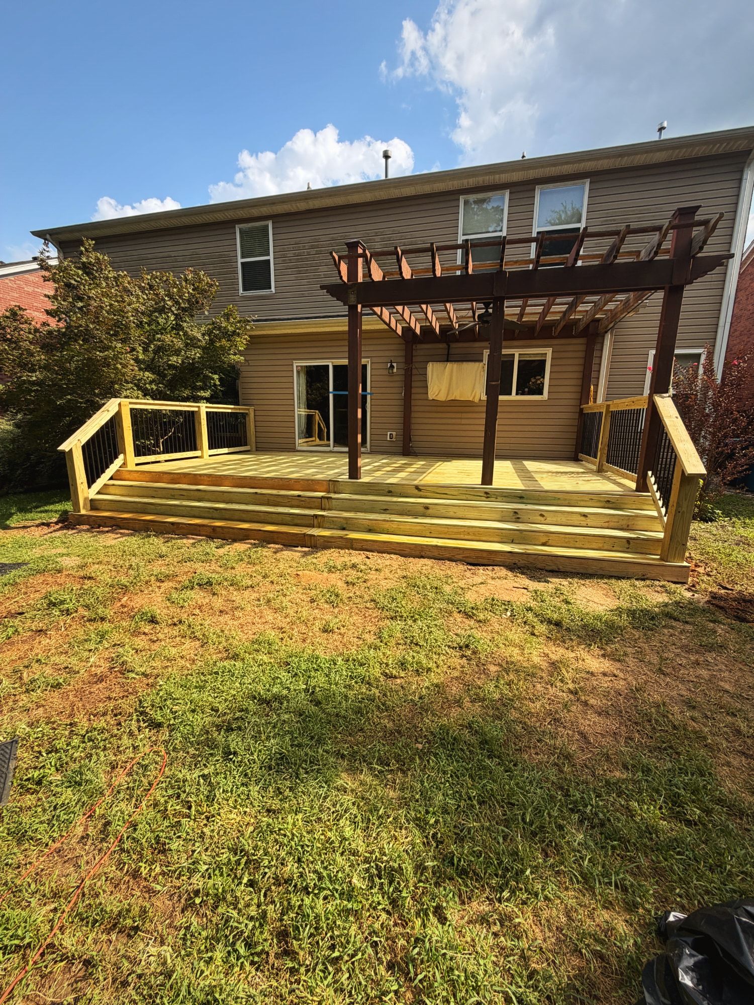Deck with corner railing and stairs