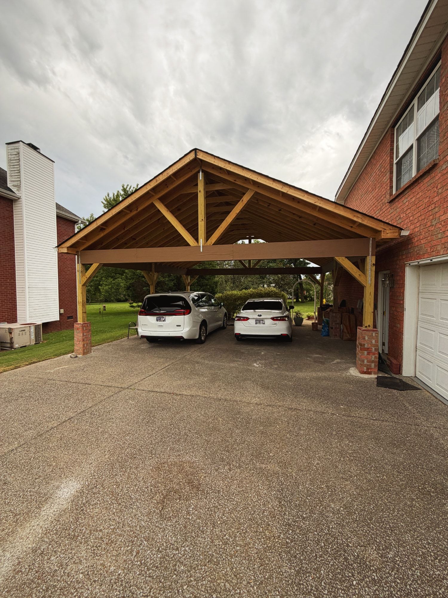 Gabled two-car carport with exposed trusses