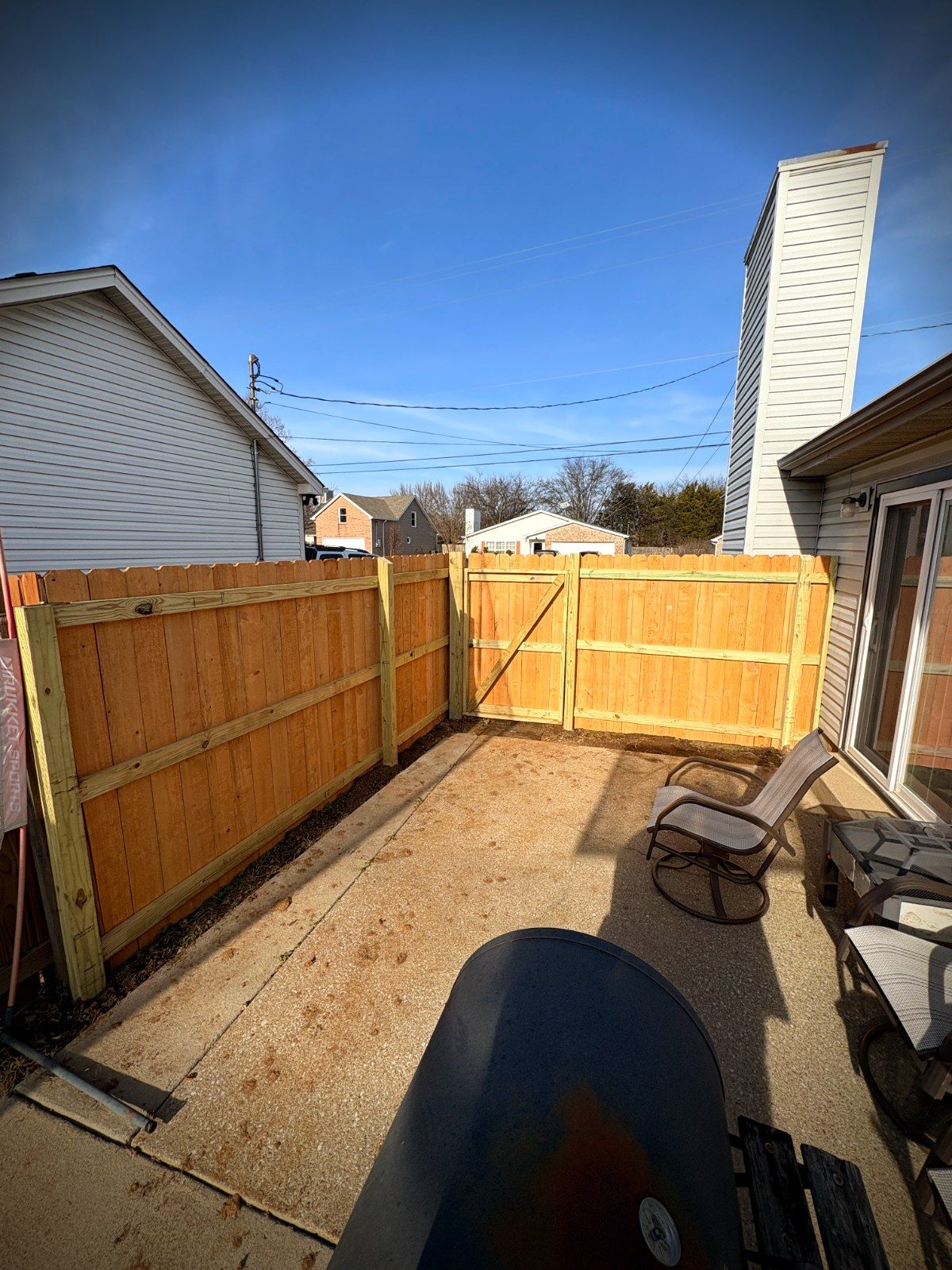 Patio fence with access gate
