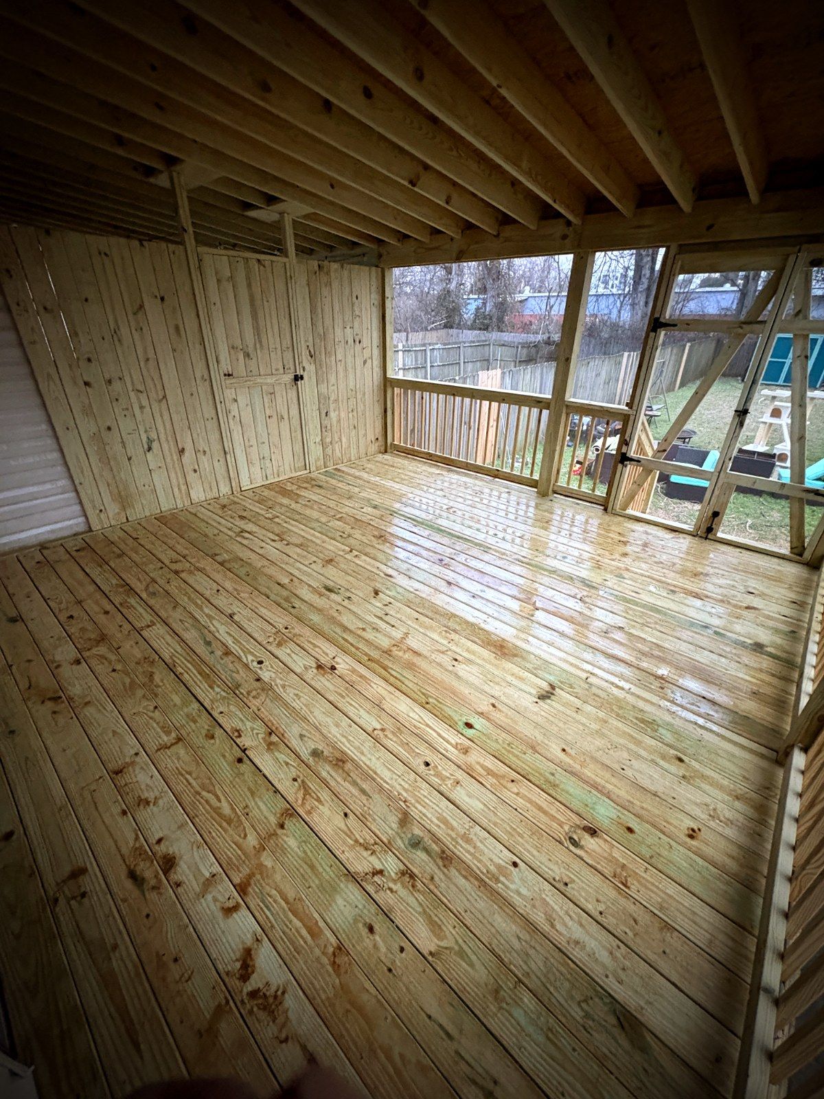 Screened porch deck floor