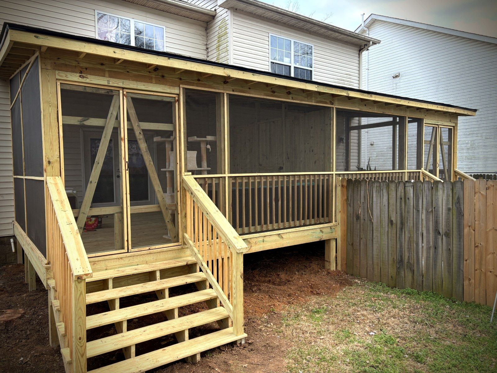 Screened porch with stairs