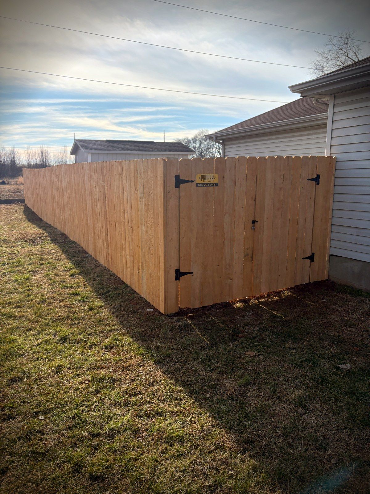 Long stockade privacy fence