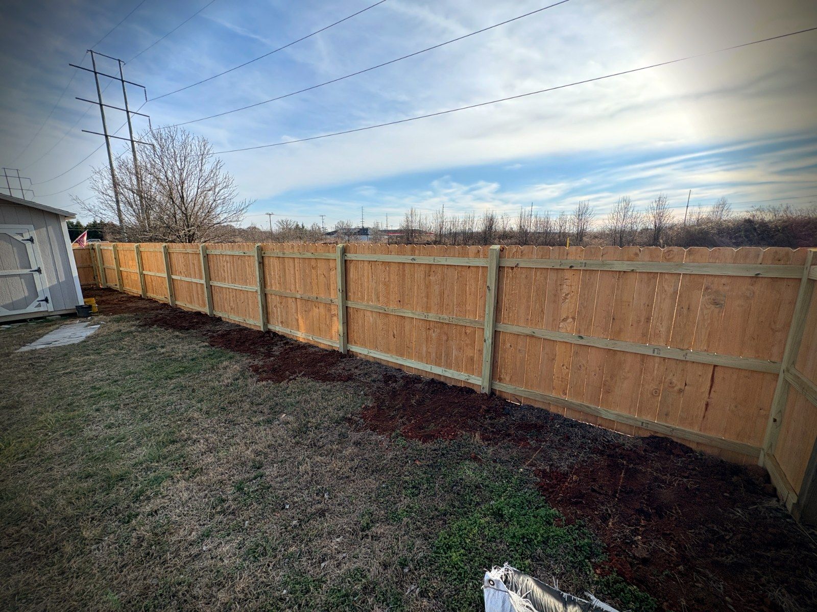 Wood privacy fence line